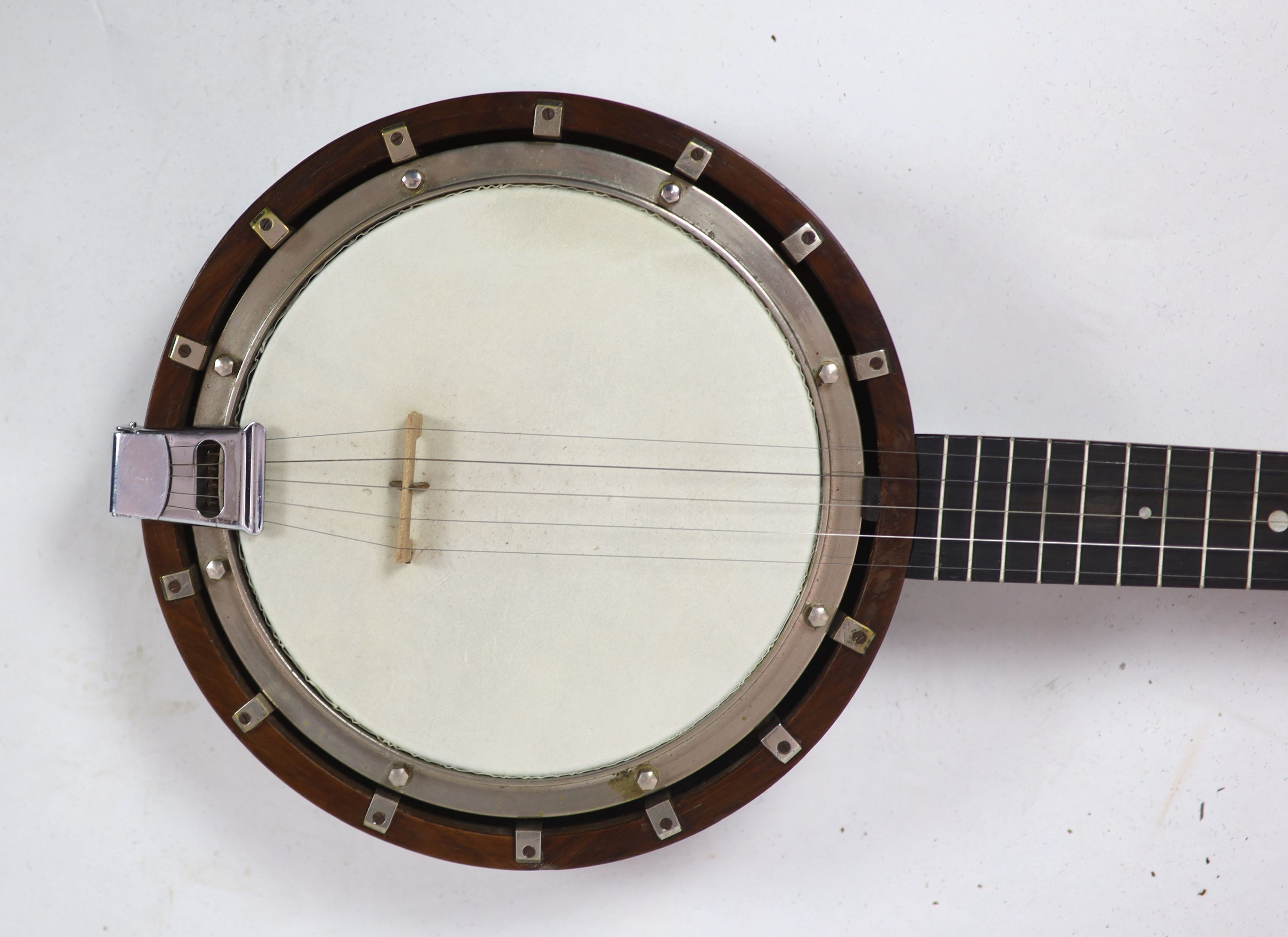 A Clifford Essex banjo overall 90cm, with distressed leather case